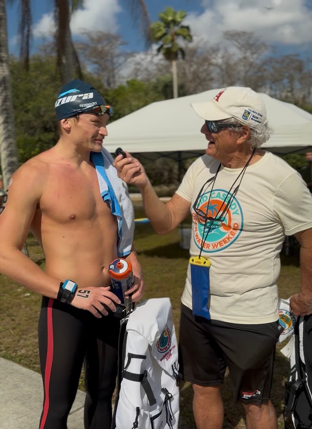 Coach Sid Cassidy interviews overall champion Lev Cherepanov at Tradewinds Park